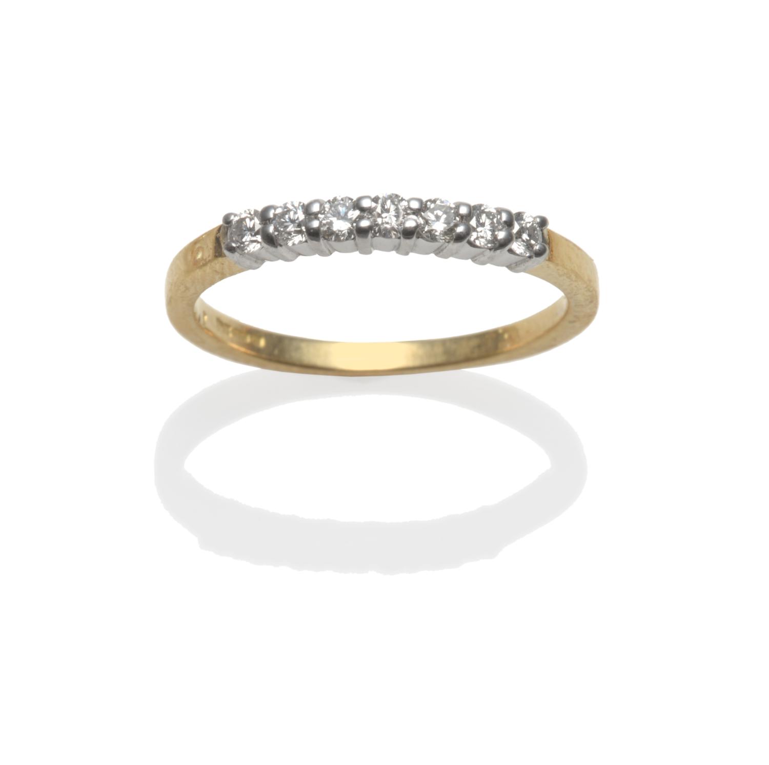 An 18 Carat Gold Diamond Seven Stone Ring