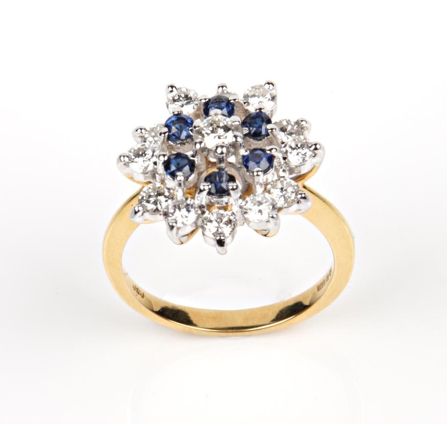 An 18 Carat Gold Diamond and Sapphire Cluster Ring