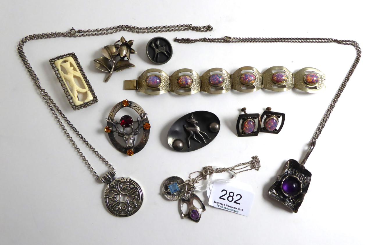 Three gem set pendants