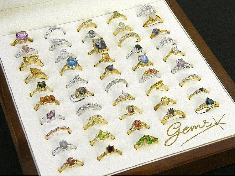 Collection of forty-eight 9ct dress rings,