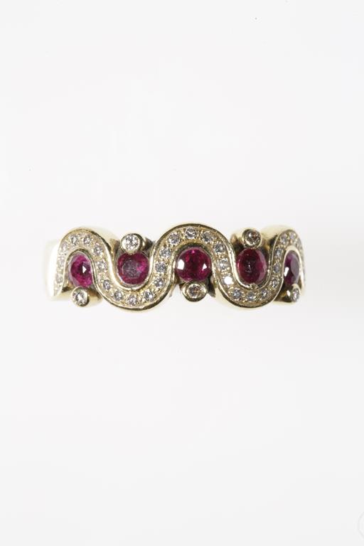 A RUBY AND DIAMOND HALF ETERNITY BAND