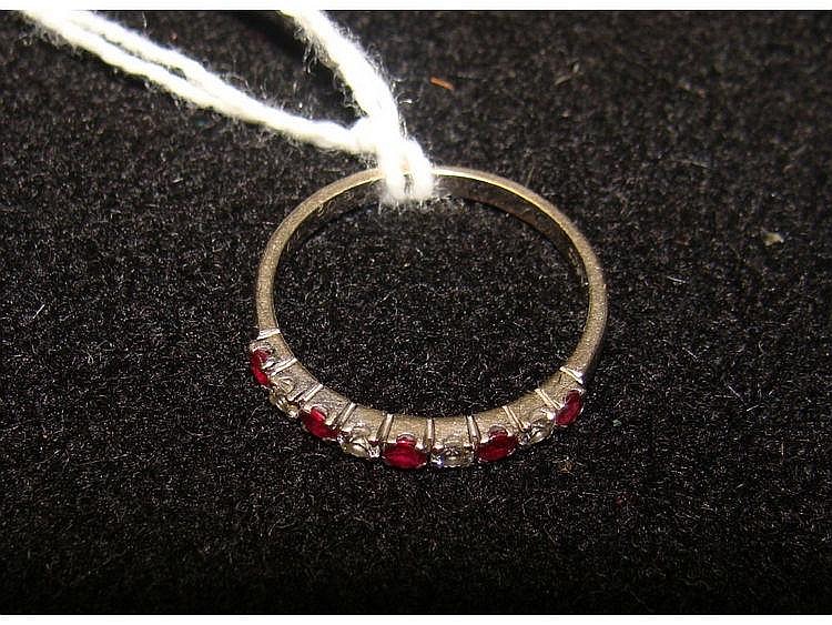 A ruby and diamond half eternity band