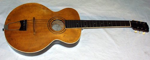 0411: GIBSON GUITAR CO. KALAMAZOO, MI. ACOUSTIC WOOD GU