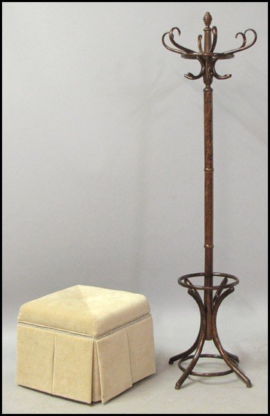 Upholstered foot stool with nailhead trim.