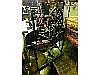 A folk art style treadle spinning wheel and