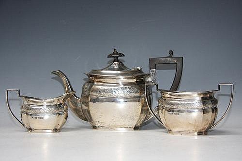 A HALLMARKED SILVER THREE PIECE TEA SET -