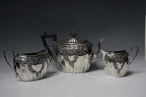 A HALLMARKED SILVER THREE PIECE TEA SET -