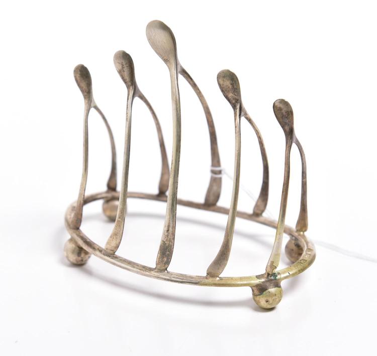 A STERLING SILVER TOAST RACK WITH WISHBONE DETAIL