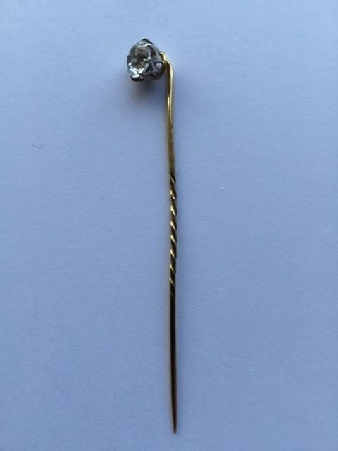 Golden tie pin