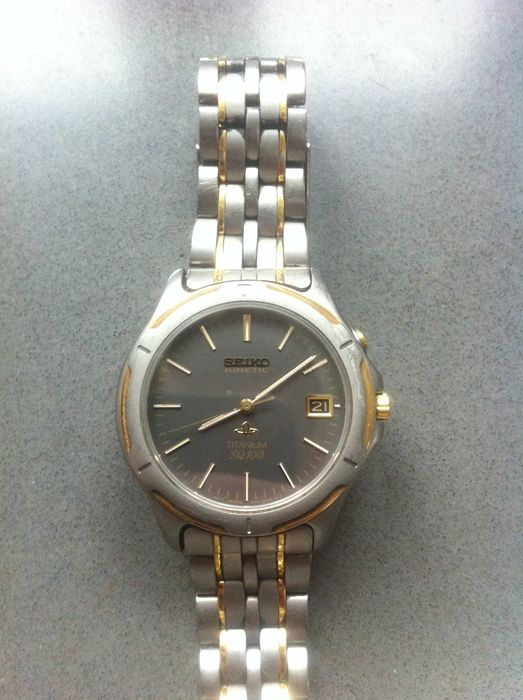 Seiko SQ100 titanium kinetic- men's watch - 1990s