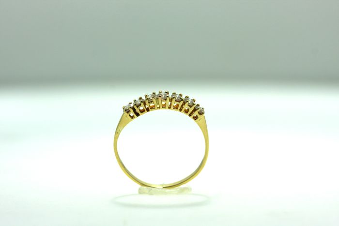 Ladies' half eternity diamond band.