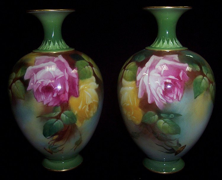 A pair of Royal Worcester vases finely painted