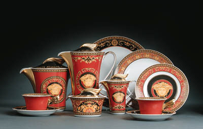 A Rosenthal red and dark-brown ground 'Medusa' pattern part dinner-service designed by Versace