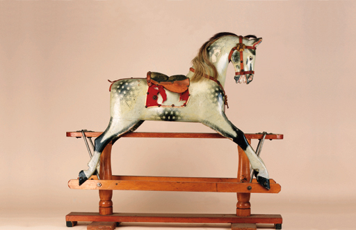 An Ayres carved and painted wood rocking horse