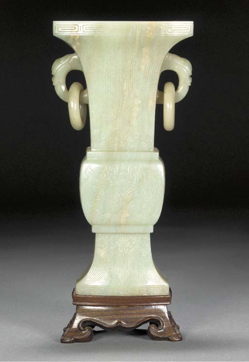 A pale celadon jade flattened gu vase 18th century