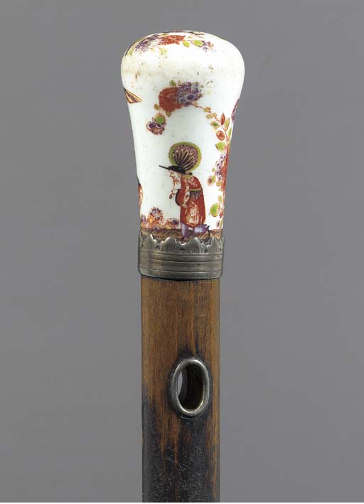 A Meissen silver-mounted cane-handle with walking stick