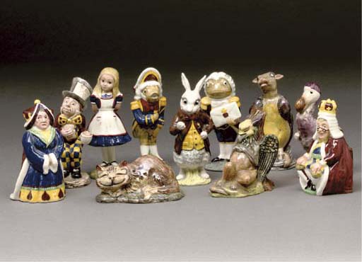 A SET OF BESWICK ALICE IN WONDERLAND FIGURES