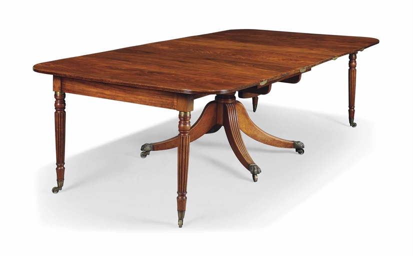 A REGENCY MAHOGANY EXTENDING DINING TABLE