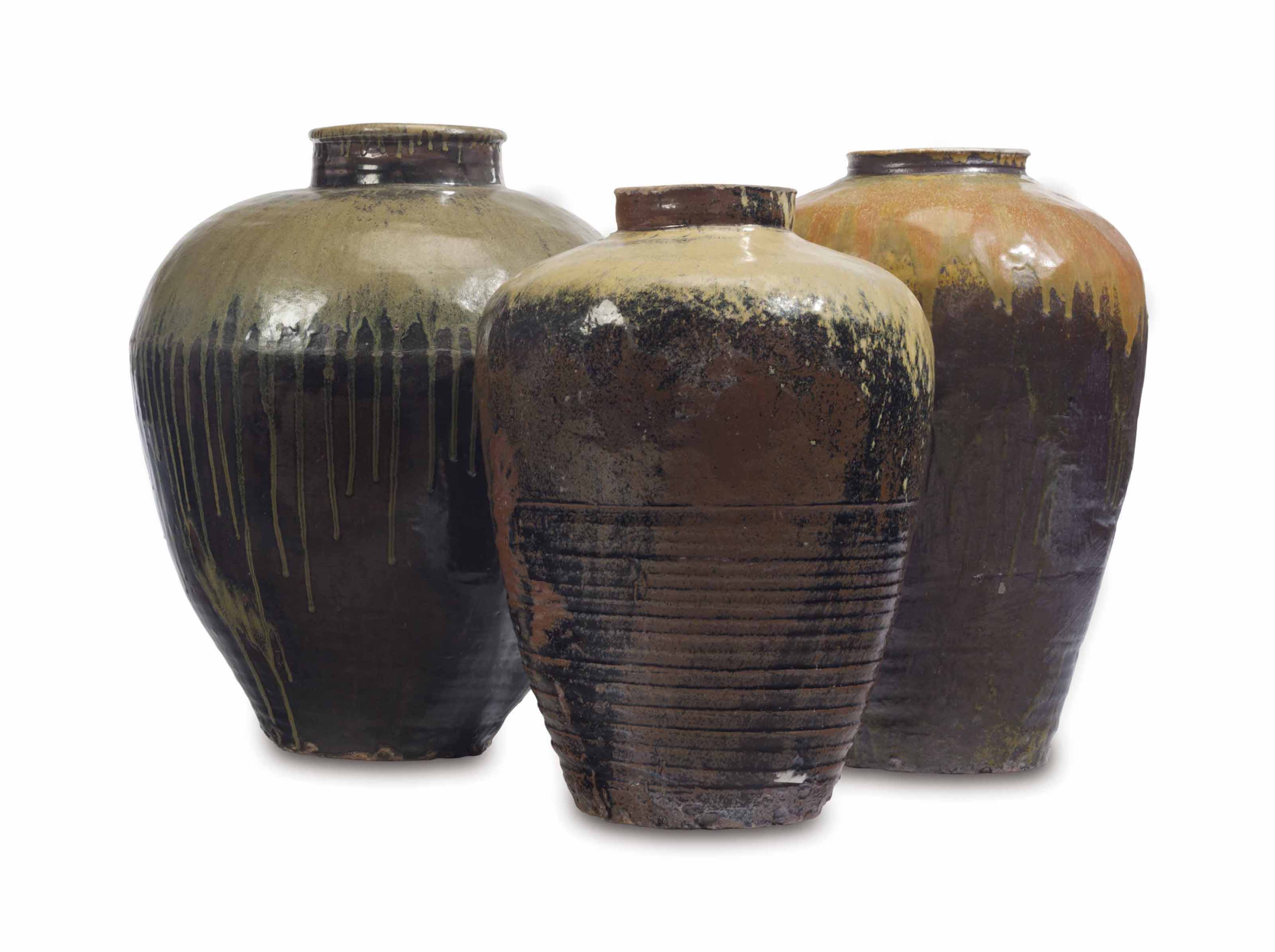 Three chinese massive drip-glazed storage jars