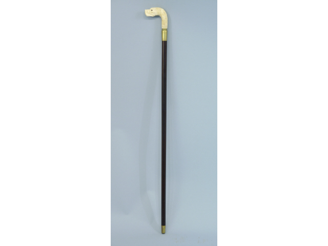 WALNUT WALKING STICK WITH CARVED BONE HANDLE