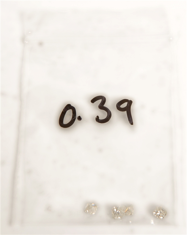 Four loose modified loose princess cut diamonds,