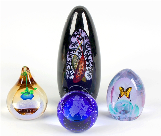 Four Caithness paperweights