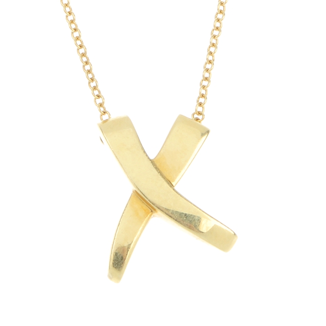 TIFFANY & CO. - a Paloma Picasso 'Kiss' pendant.
