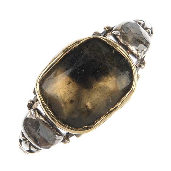 A late Georgian quartz and diamond three-stone ring.