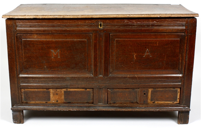 An antique oak mule chest