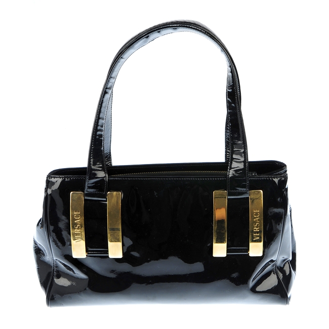 VERSACE - a black patent leather bag.