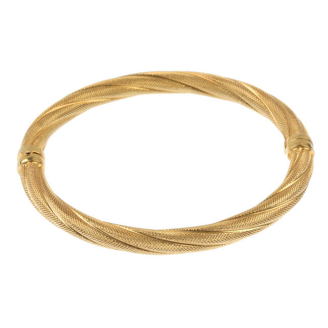 A 9ct gold hinged bangle.
