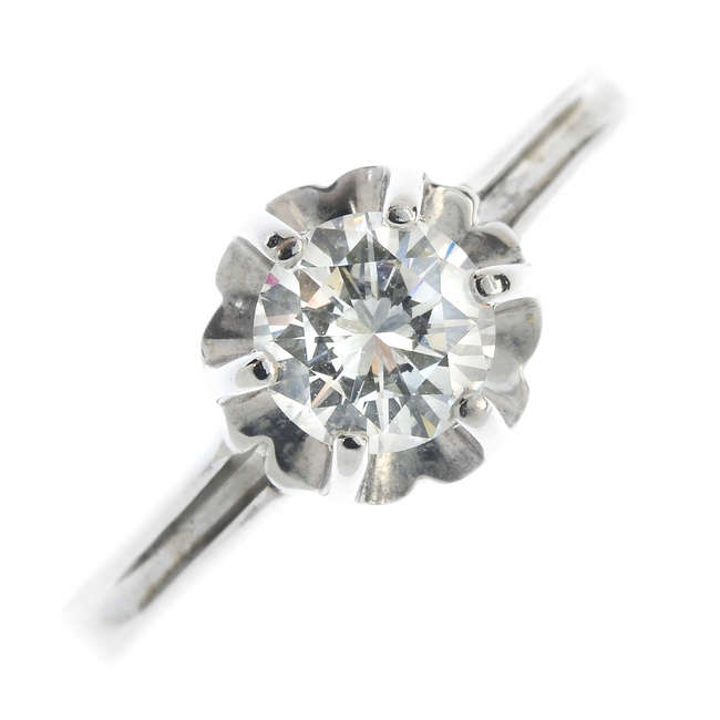 A 14ct gold diamond single-stone ring.