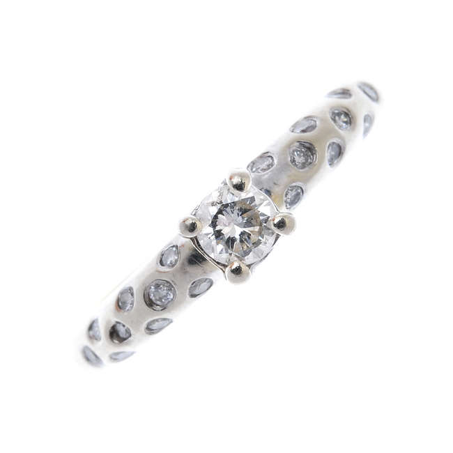 A 14ct gold diamond single-stone ring.