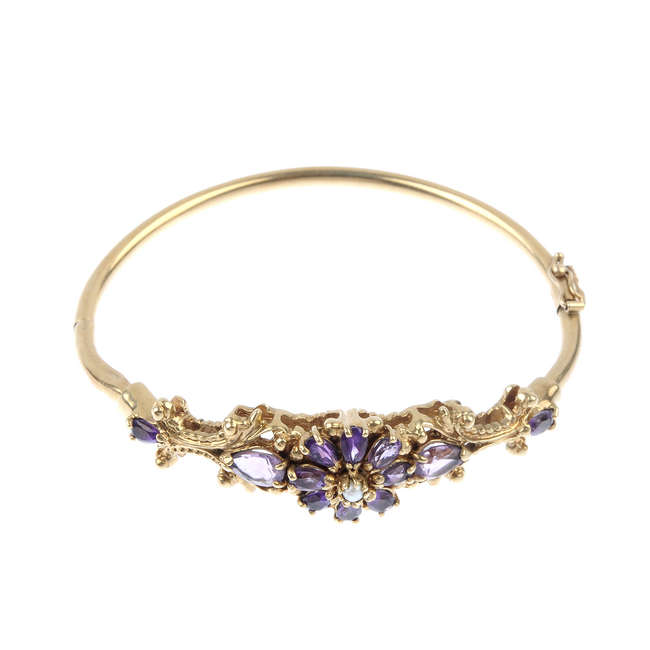 A 9ct gold amethyst and split pearl hinged bangle.