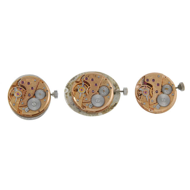 OMEGA - a group of 6 watch movements.