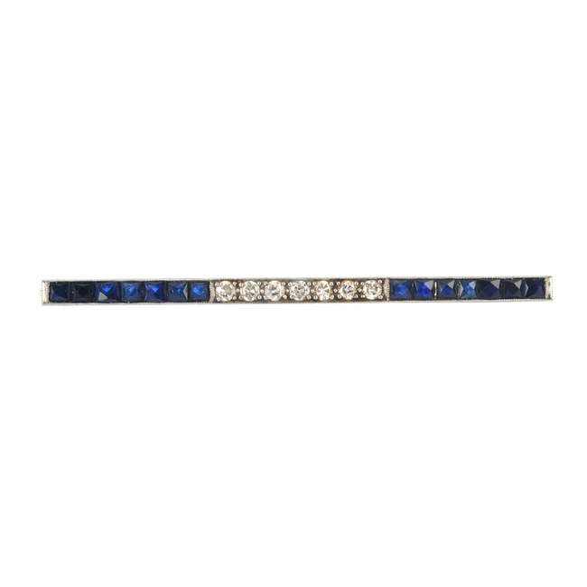 A mid 20th century sapphire and diamond bar brooch.
