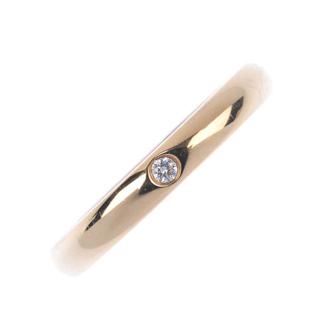 TIFFANY & CO. - a diamond band ring.