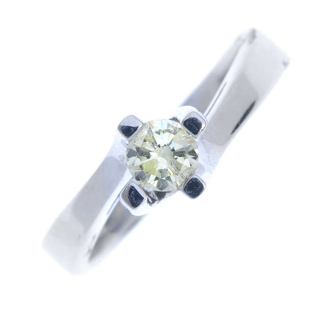 A 14ct gold diamond single-stone ring.