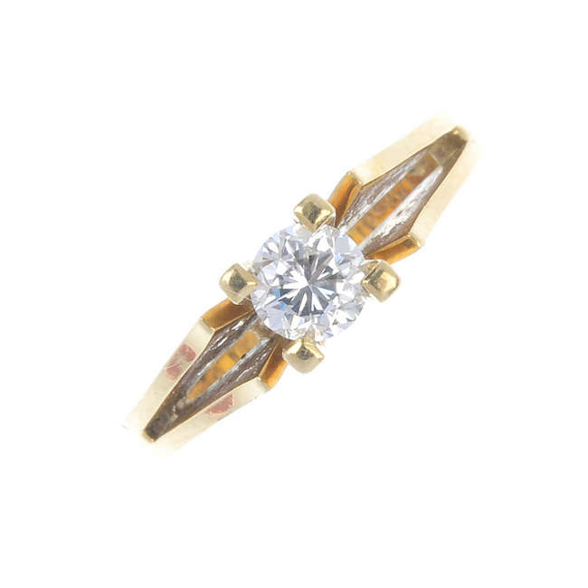 An 18ct gold diamond single-stone ring.