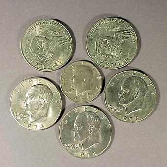 Five United States $1 Coins and One United States $.50 Coin