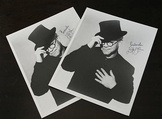 Elton John: Two autographed publicity photographs