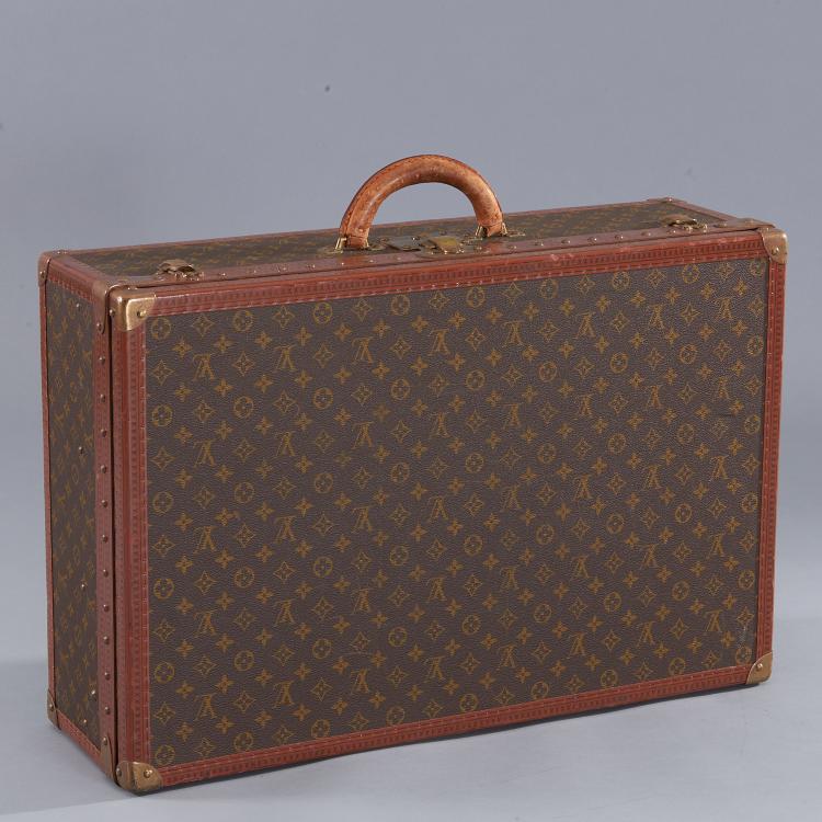 Louis Vuitton Monogram hard sided suitcase