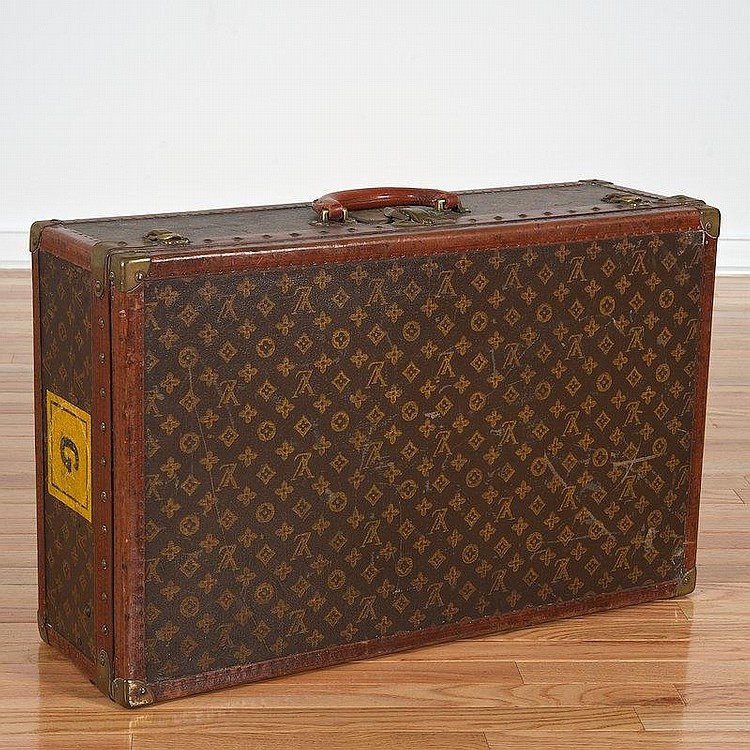 Louis Vuitton Monogram hard sided suitcase