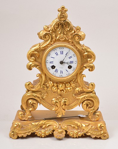 French gilt metal mantel clock