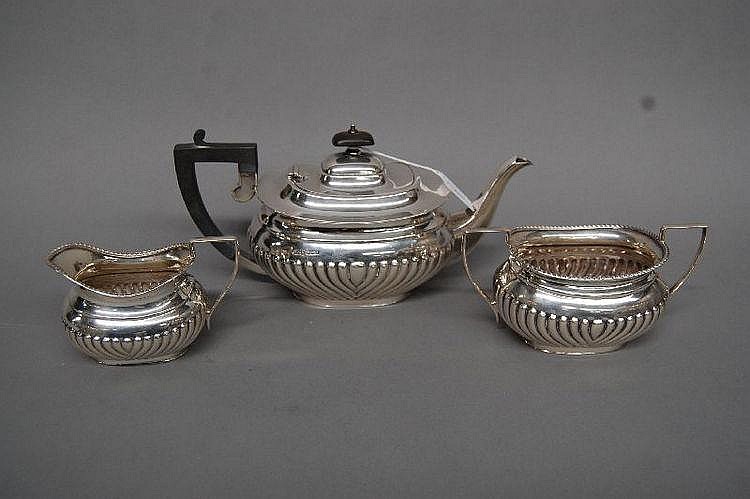 English sterling silver three piece tea service,