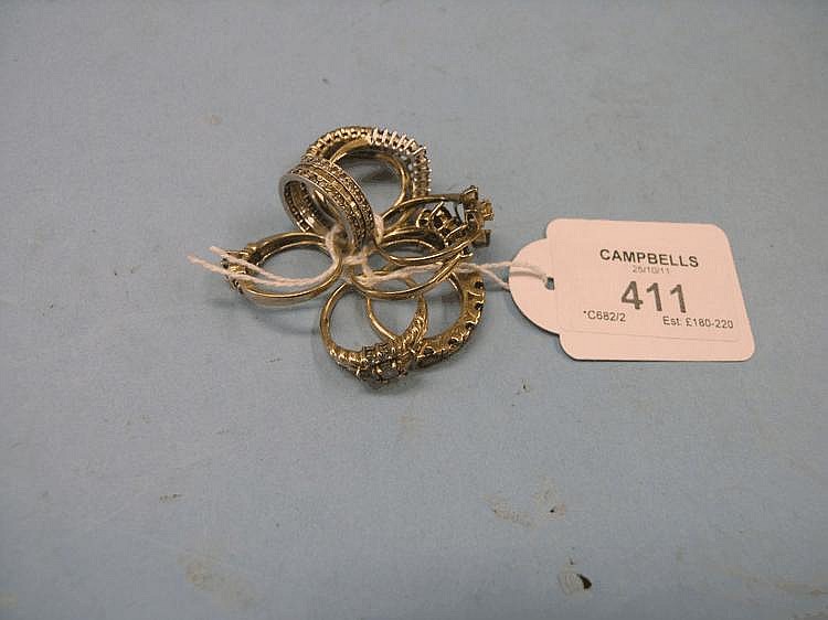 Eight various 9ct. gold dress rings