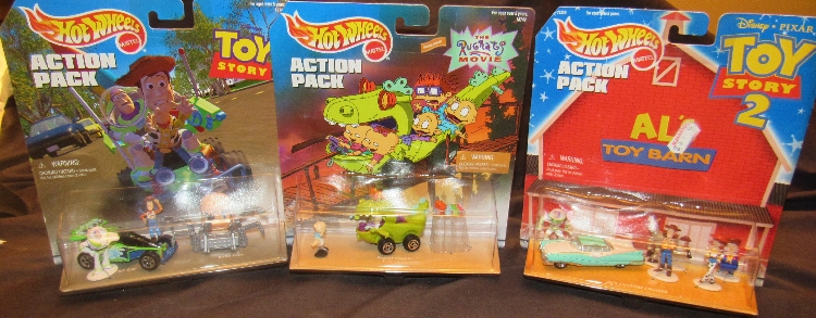 Three Hot Wheel Action packs (Toy Story