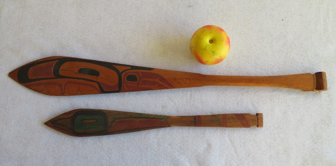Two Northwest coast Native American dancing paddles
