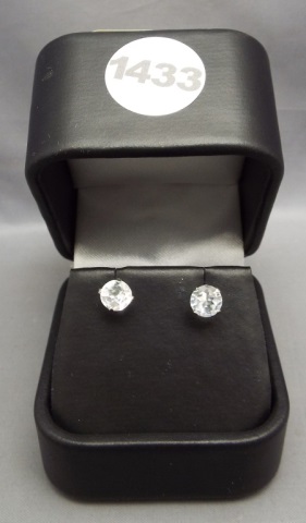 Sterling silver post back earrings with white