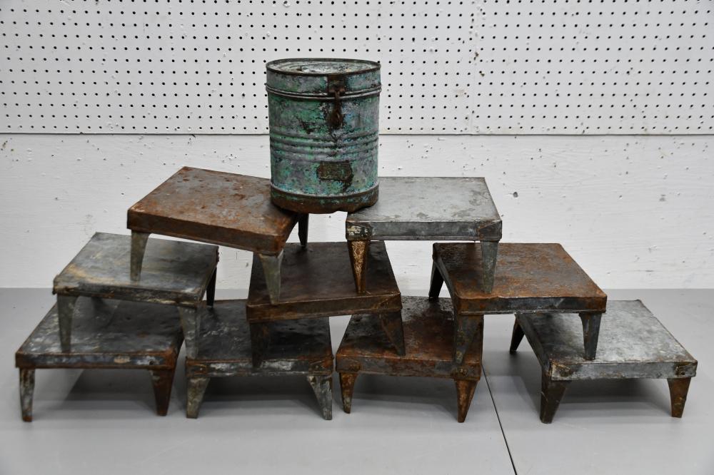 group lot of metal risers